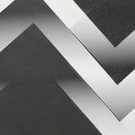 A minimalist abstract design featuring zigzag patterns in monochrome tones.